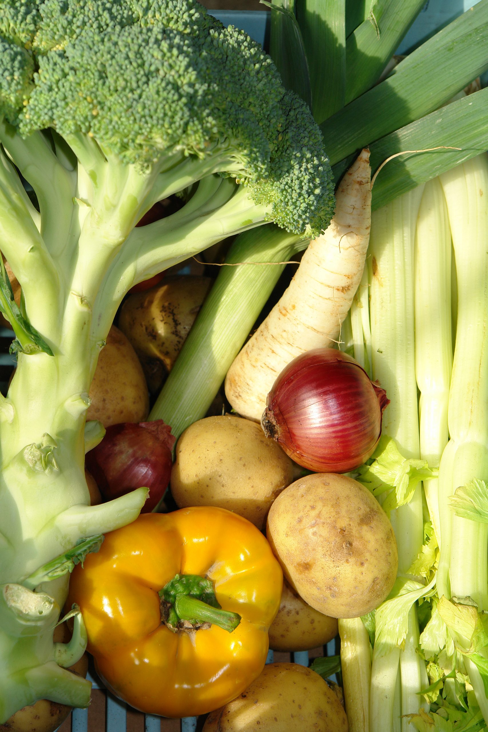 Wooden crates of fresh produce at a grocery store